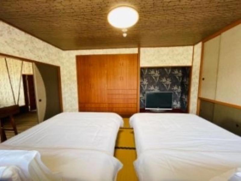 Postel nebo postele na pokoji v ubytování HOTEL COCOA RESORT