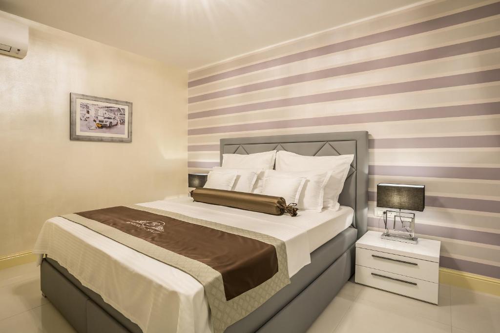 Postel nebo postele na pokoji v ubytování Guest House Benedict