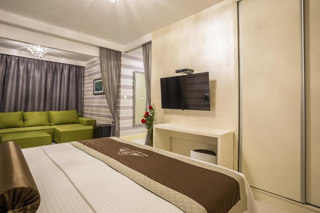 TV a/nebo společenská místnost v ubytování Guest House Benedict