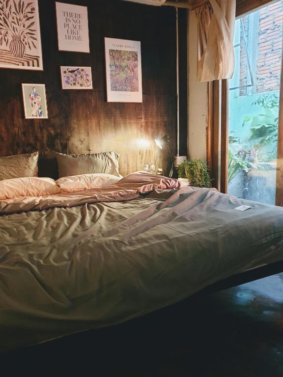 Giường trong phòng chung tại Yên homestay