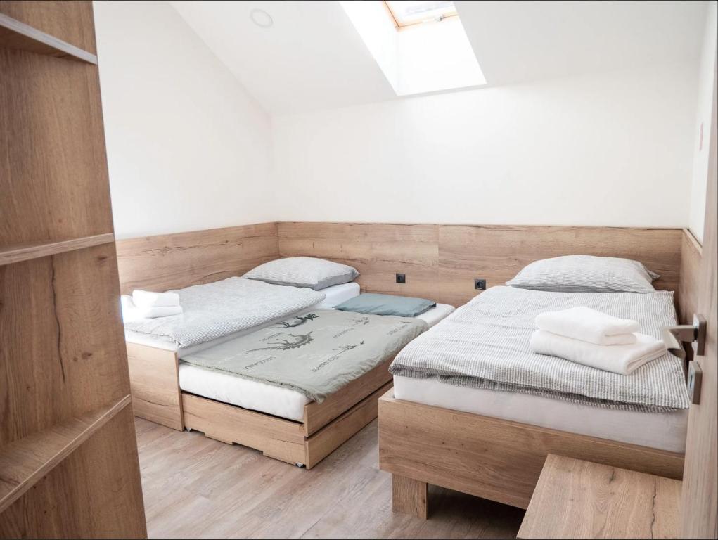 Postel nebo postele na pokoji v ubytování Apartmán Petőfiho