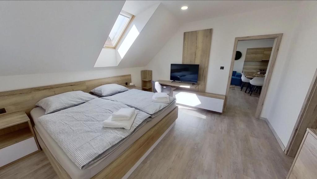 Postel nebo postele na pokoji v ubytování Apartmán Petőfiho