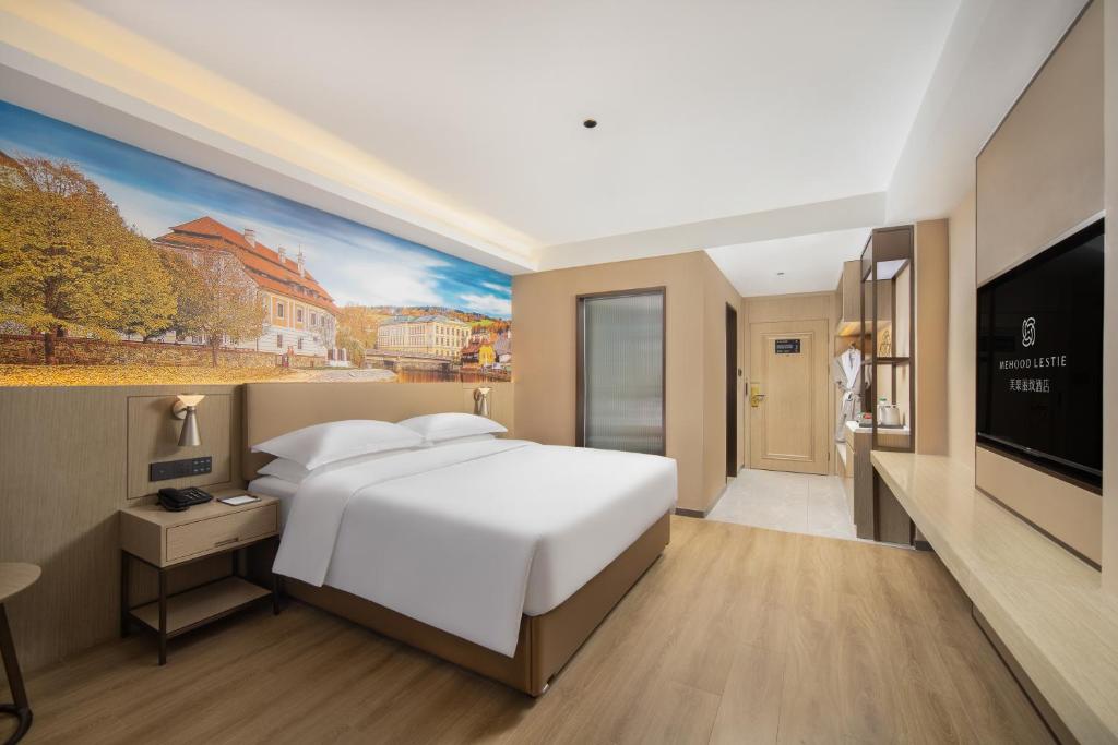 Postel nebo postele na pokoji v ubytování Landis Hotel