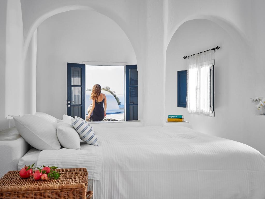 Postel nebo postele na pokoji v ubytování Finikia Memories Hotel
