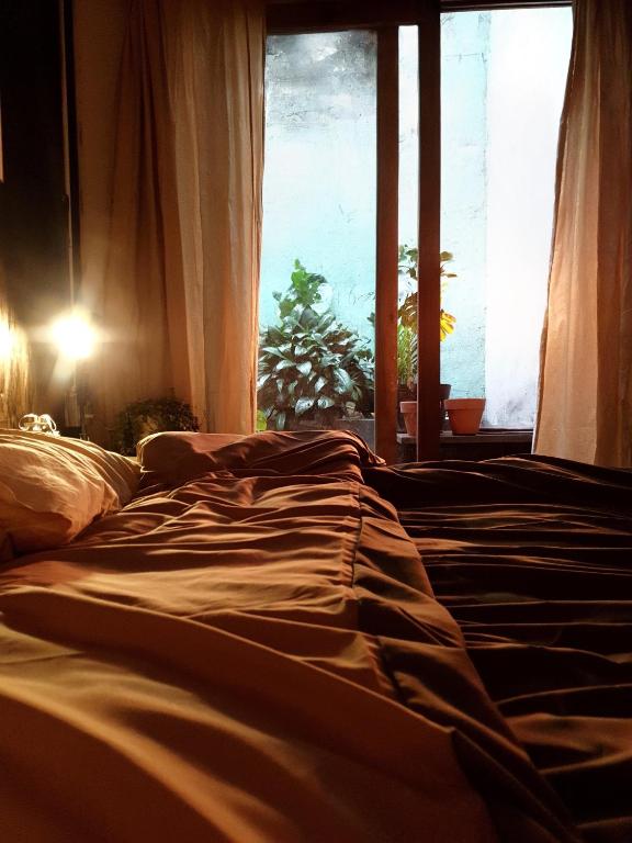 Giường trong phòng chung tại Yên homestay