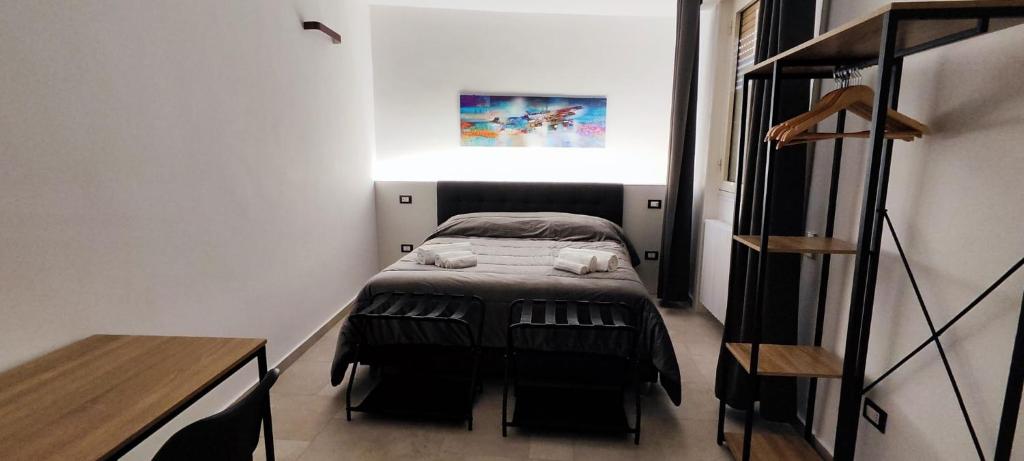 Postel nebo postele na pokoji v ubytování Sisina's Suite