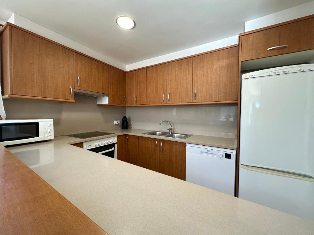 Kuchyň nebo kuchyňský kout v ubytování Agi Torre Quimeta Apartments