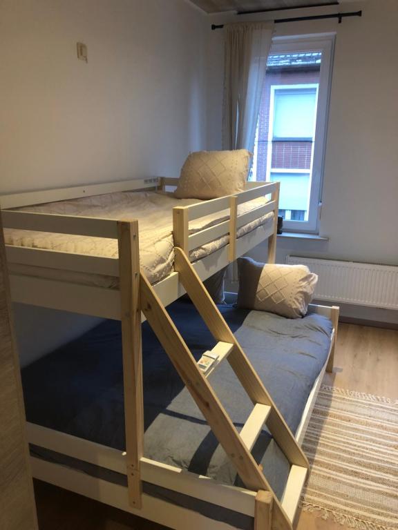 Palanda nebo palandy na pokoji v ubytování Vakantiewoning De Passerelle