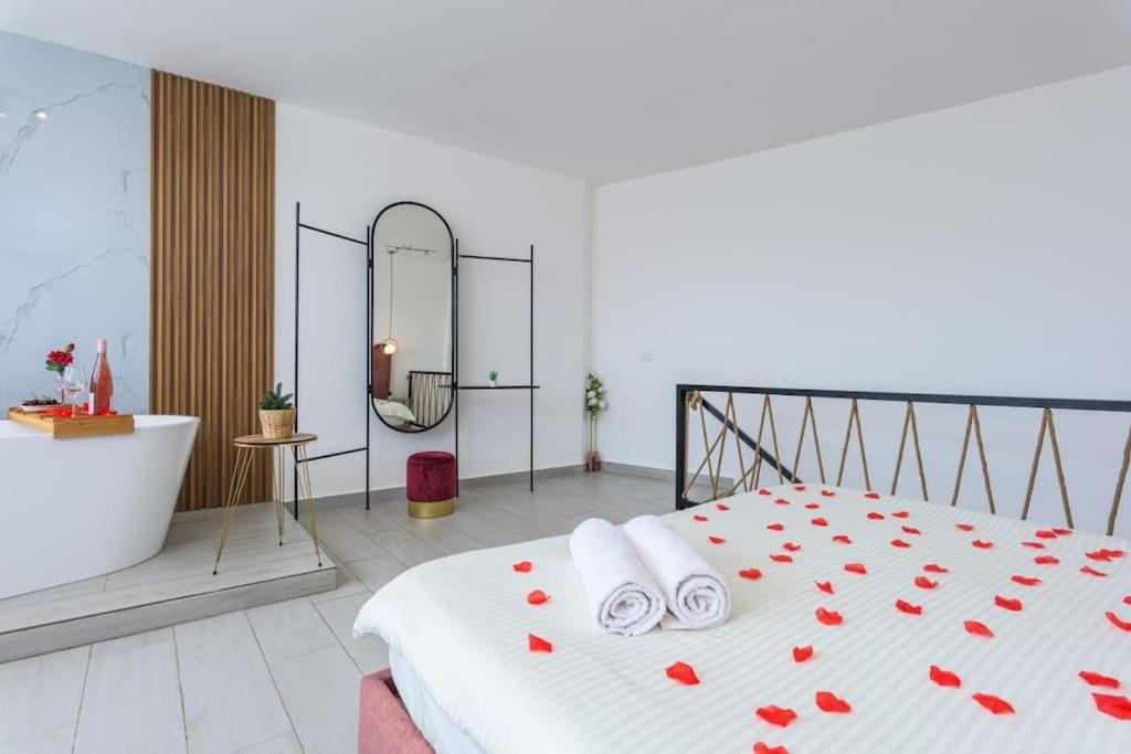 Postel nebo postele na pokoji v ubytování Marée Guest House
