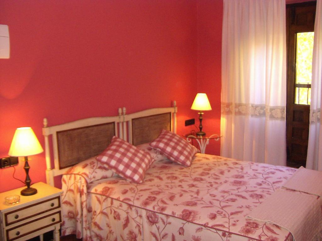 Posteľ alebo postele v izbe v ubytovaní Hotel Posada Molino del Cubo