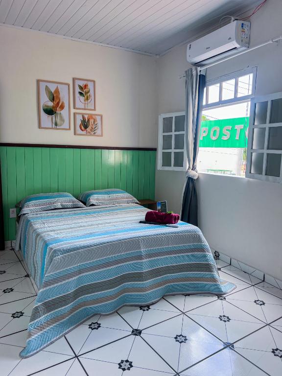 Postel nebo postele na pokoji v ubytování Pousada Sempre Viva Lençóis