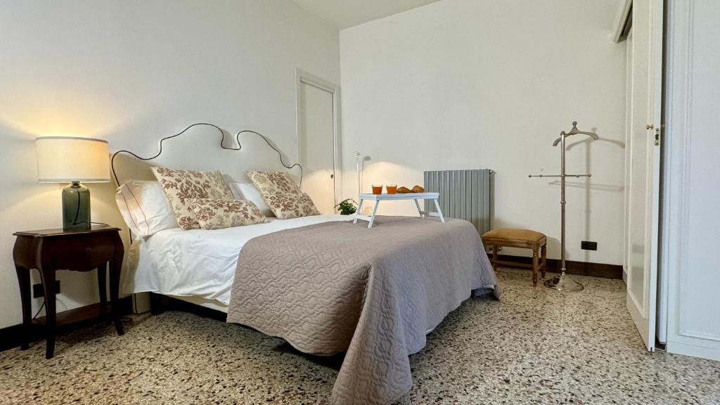 Łóżko lub łóżka w pokoju w obiekcie City Apartments Rialto