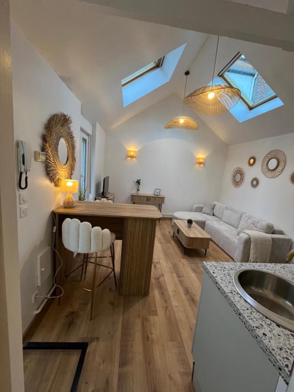 Postel nebo postele na pokoji v ubytování Appartement cosy le Daunou