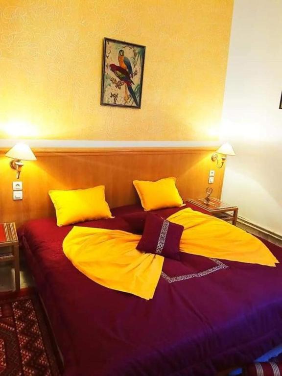 Postel nebo postele na pokoji v ubytování Dar Henani