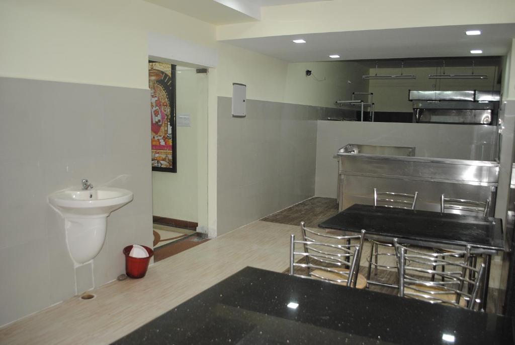 Kuchyň nebo kuchyňský kout v ubytování SSR Hotel