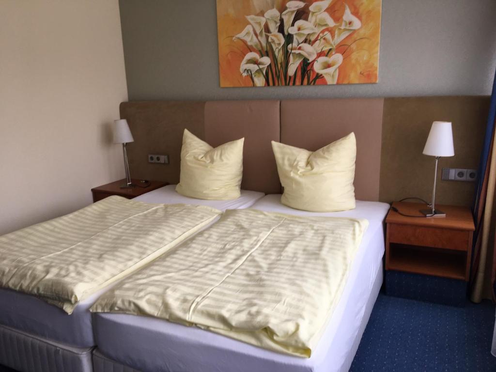 Postel nebo postele na pokoji v ubytování Motel Monteur