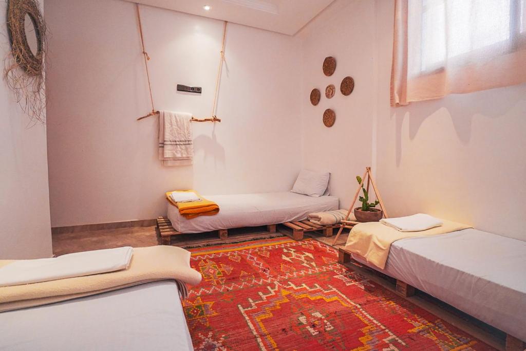 Postel nebo postele na pokoji v ubytování Desart Hostel