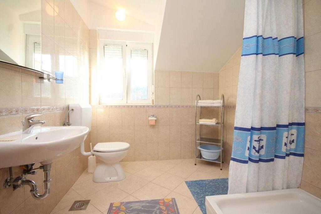 Kúpeľňa v ubytovaní Apartments Sea view