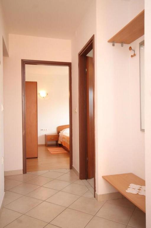 Posteľ alebo postele v izbe v ubytovaní Apartments Sea view