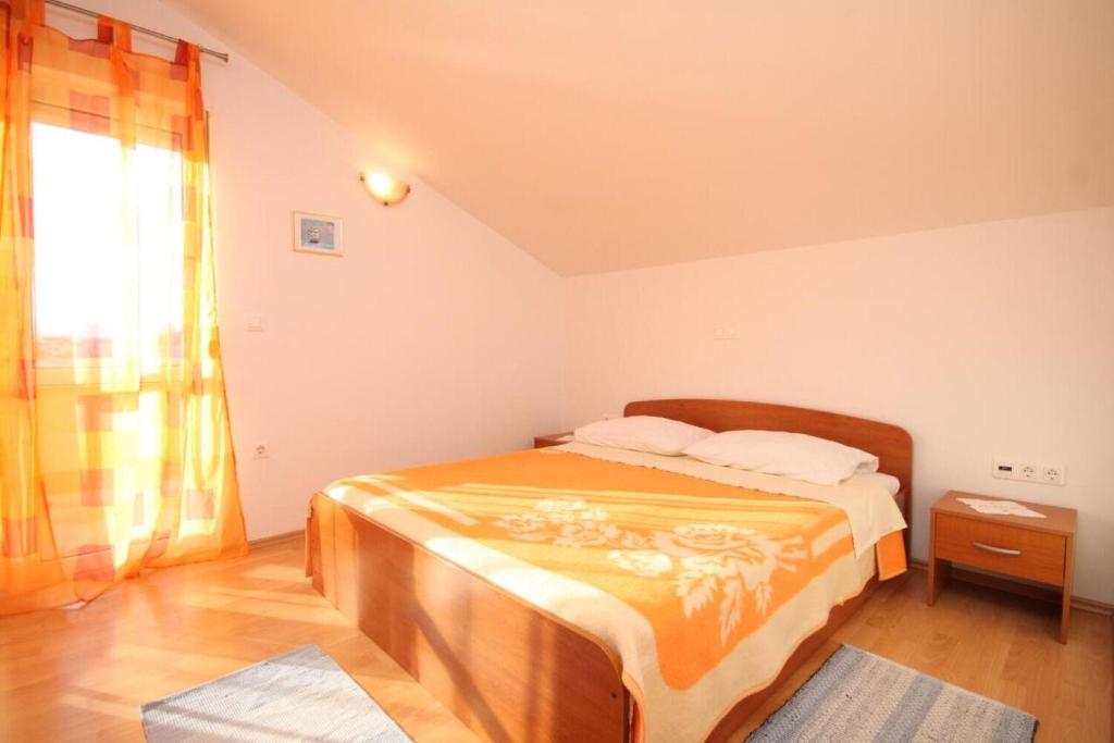 Posteľ alebo postele v izbe v ubytovaní Apartments Sea view