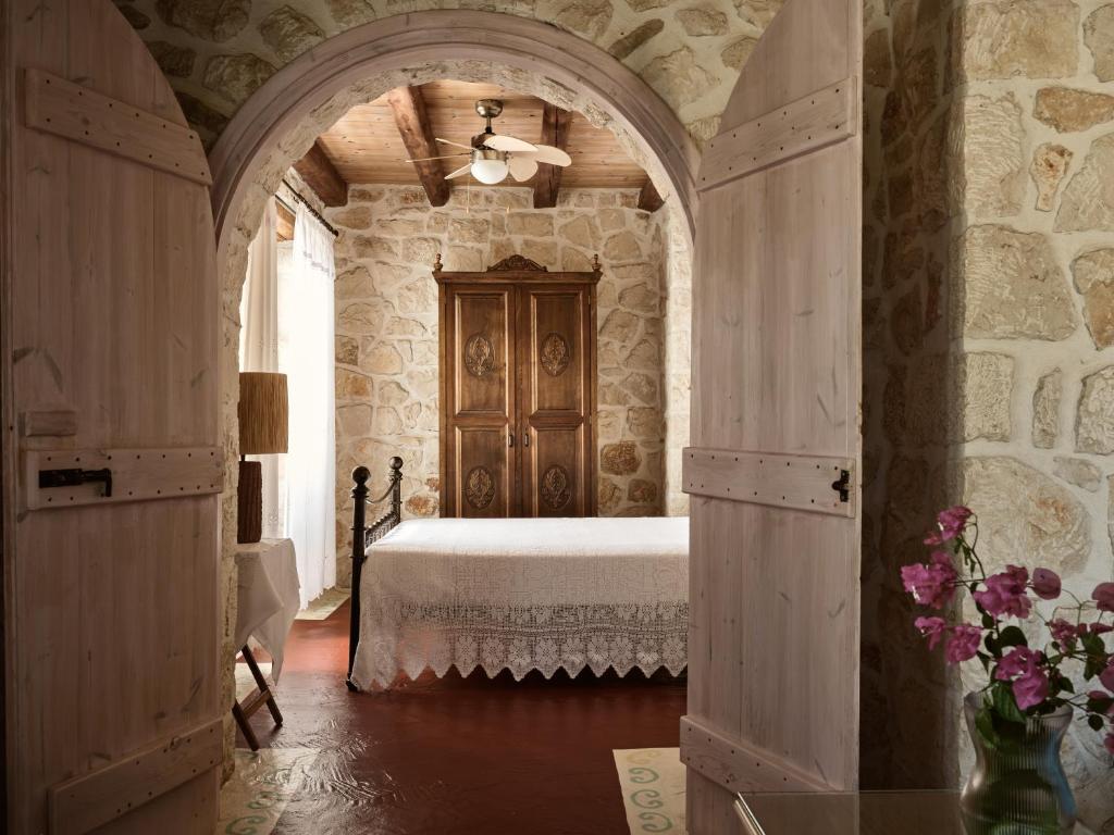 Postel nebo postele na pokoji v ubytování Zakynthos Villas