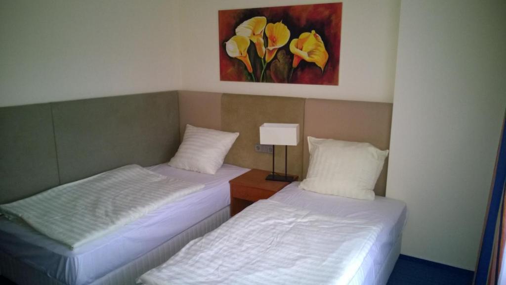 Postel nebo postele na pokoji v ubytování Motel Monteur