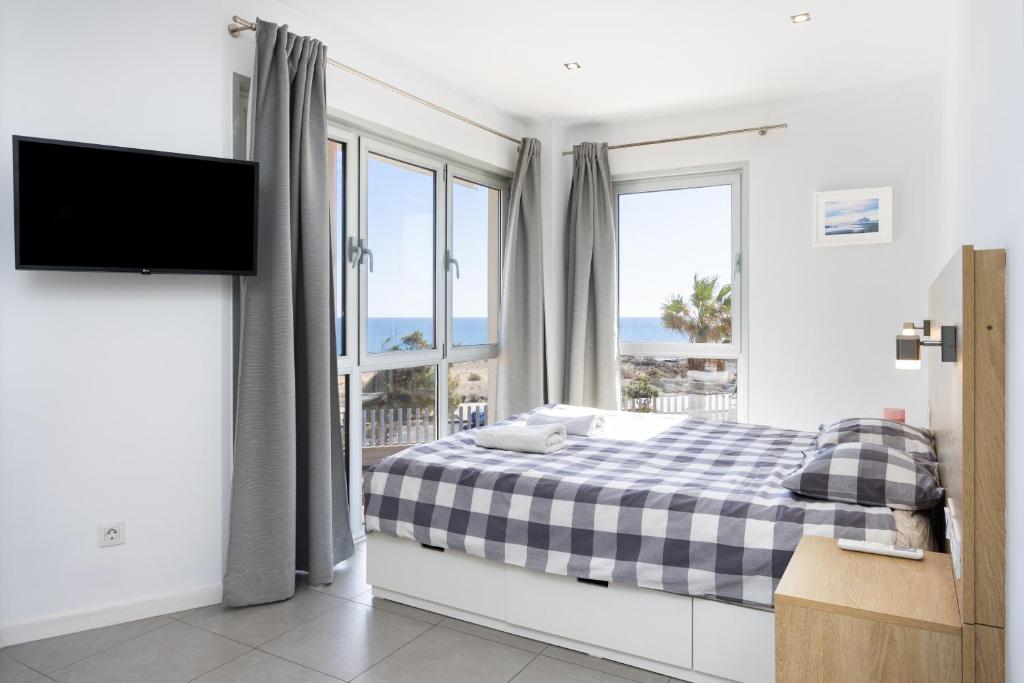 Postel nebo postele na pokoji v ubytování Panoramic sea view apartment