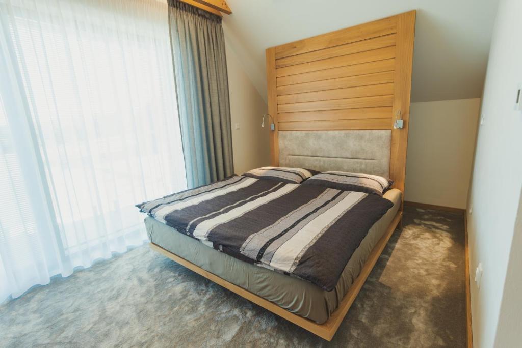 Postel nebo postele na pokoji v ubytování Vila Terra Aurea