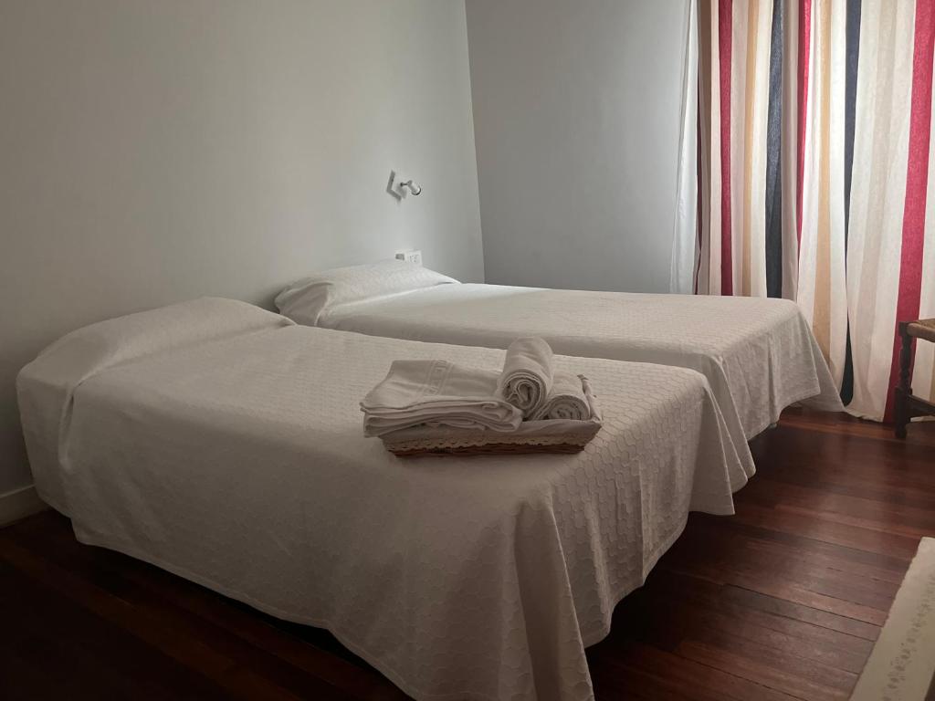 Postel nebo postele na pokoji v ubytování Hotel Boliña