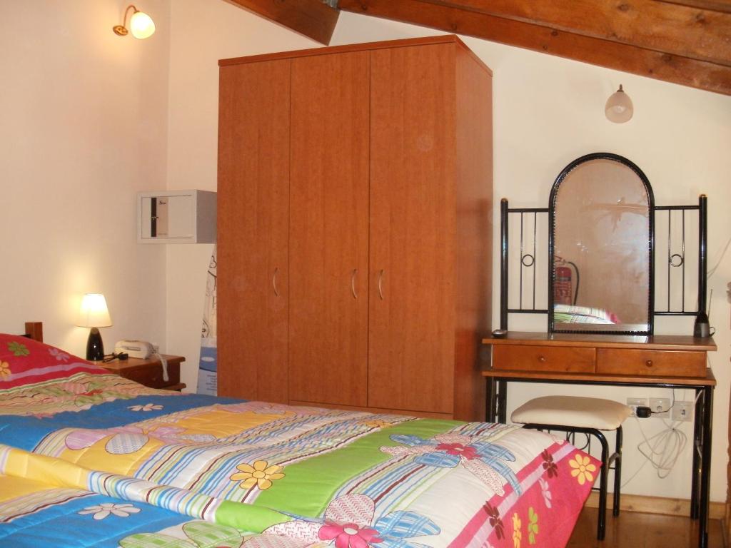 Postel nebo postele na pokoji v ubytování Irene Maisonettes