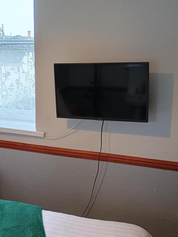 TV a/nebo společenská místnost v ubytování sark guest house
