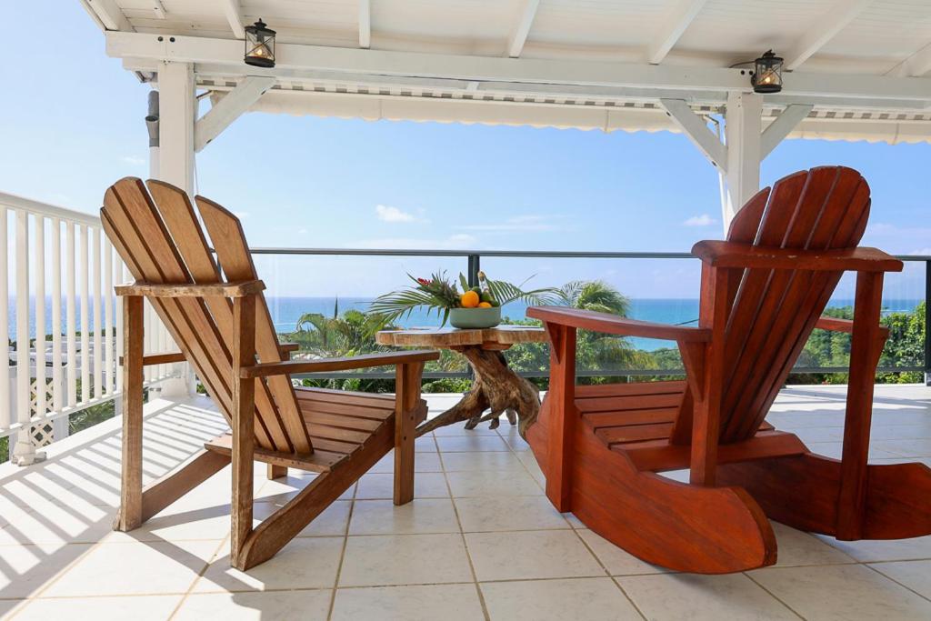 Balkón nebo terasa v ubytování Villa Constellation vue Mer piscine et plage à pied