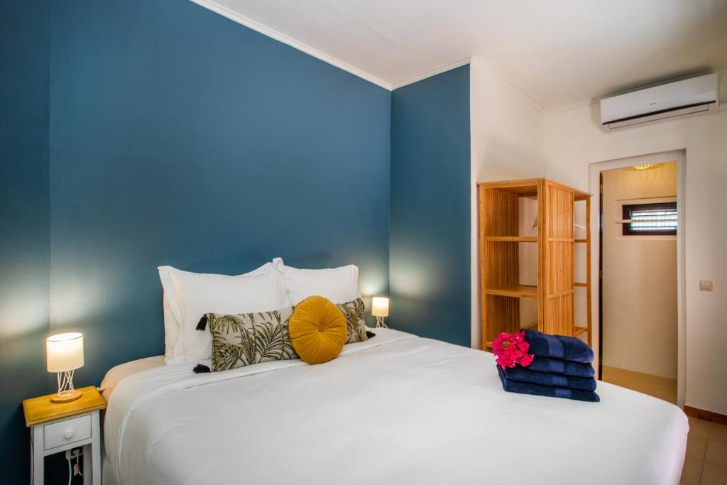 Postel nebo postele na pokoji v ubytování Bloublou Apartments Curaçao