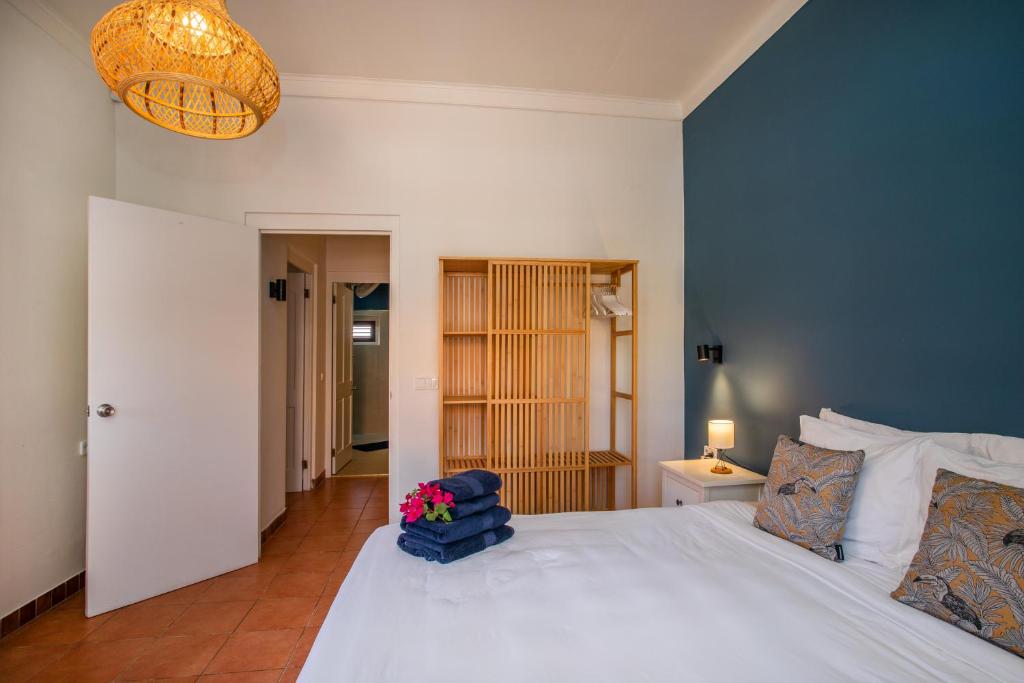 Postel nebo postele na pokoji v ubytování Bloublou Apartments Curaçao