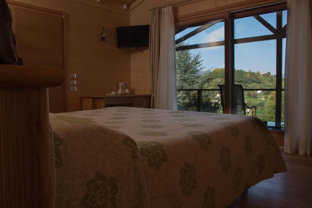 Posteľ alebo postele v izbe v ubytovaní Country House Barone D'Asolo