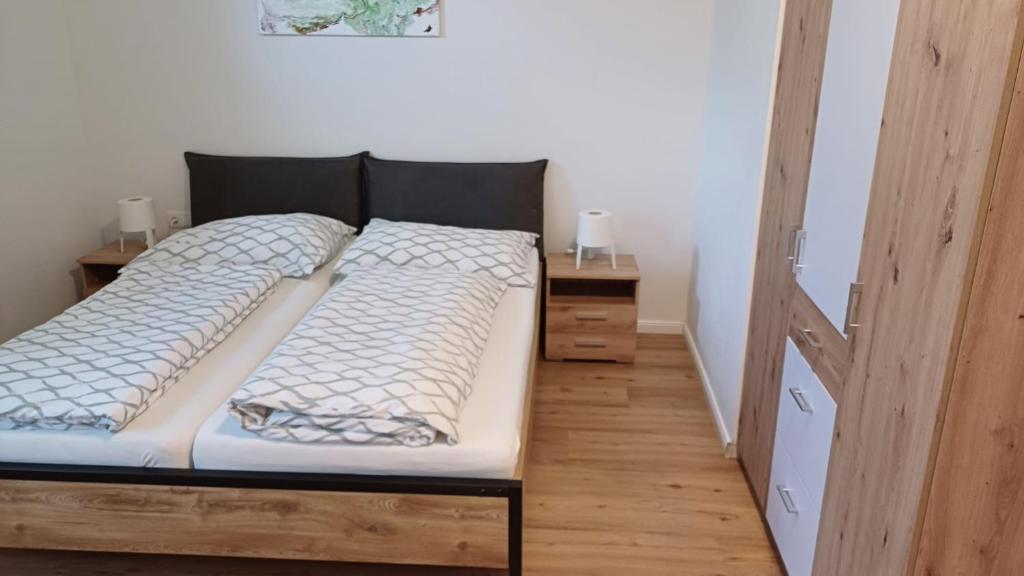 Postel nebo postele na pokoji v ubytování Ferienwohnungen Hebalm