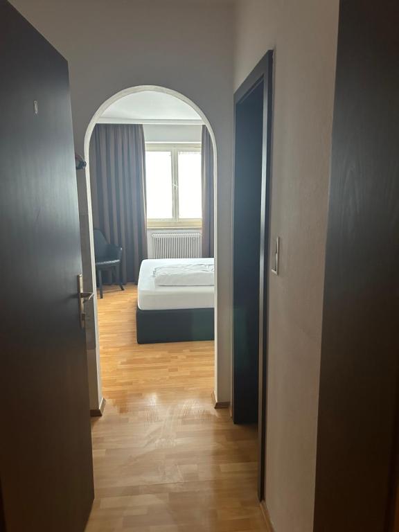 Postel nebo postele na pokoji v ubytování Hotel Berg