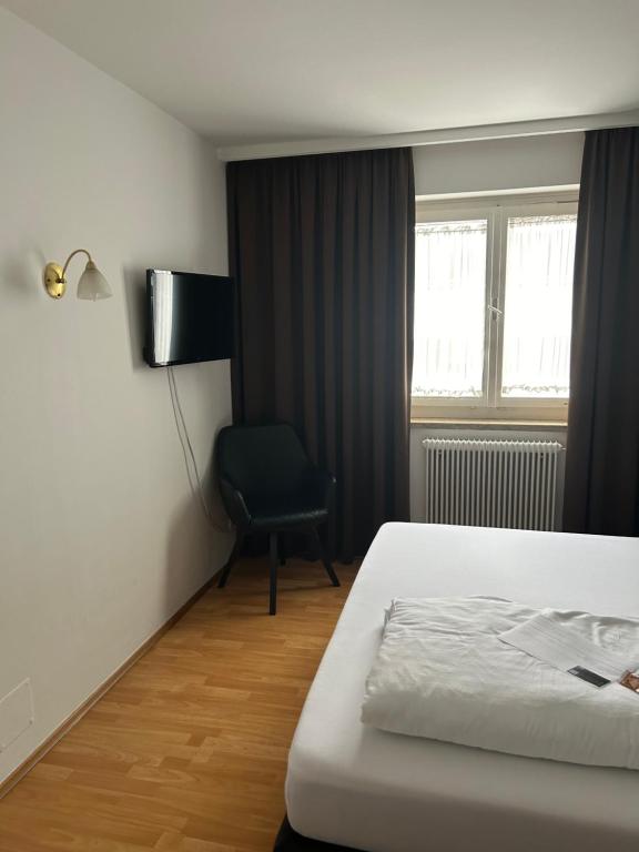 Postel nebo postele na pokoji v ubytování Hotel Berg