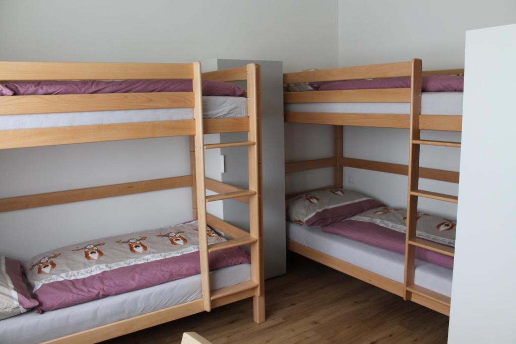 Postel nebo postele na pokoji v ubytování Ferienwohnungen Hebalm
