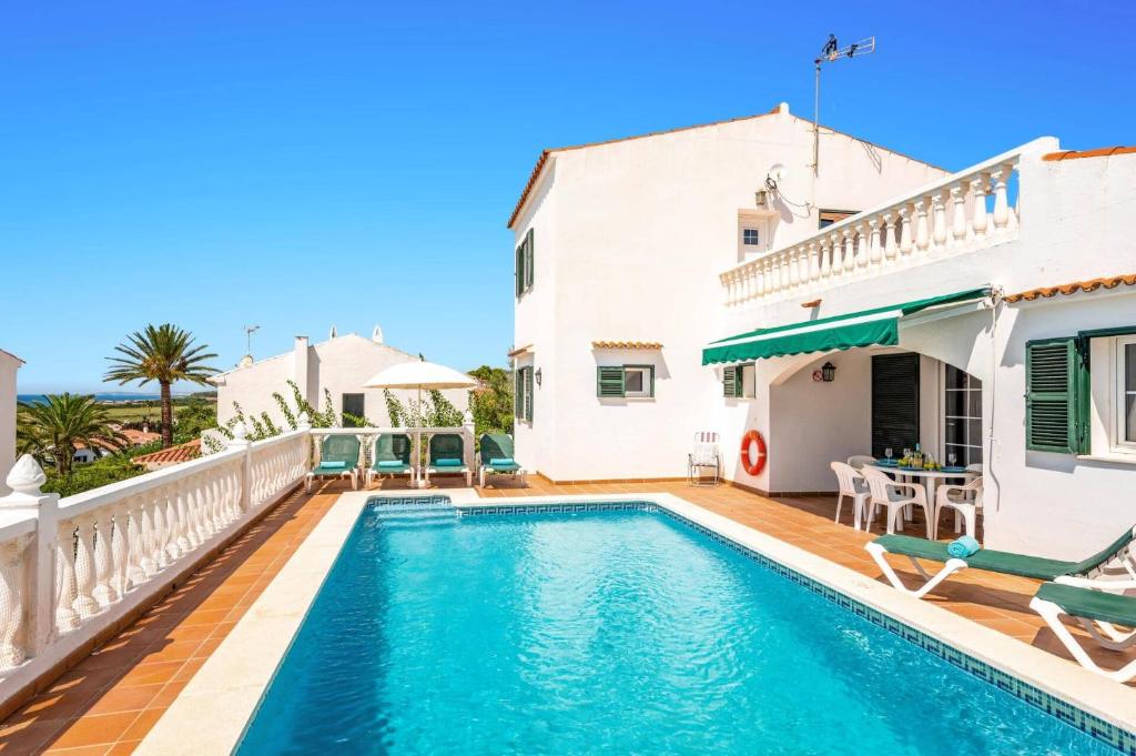 een villa met zwembad voor een huis bij Villa Laurel by Villa Plus in Alaior