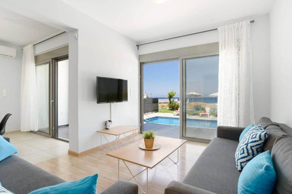 Televízia a/alebo spoločenská miestnosť v ubytovaní Villa Rhodes Sea View by Villa Plus