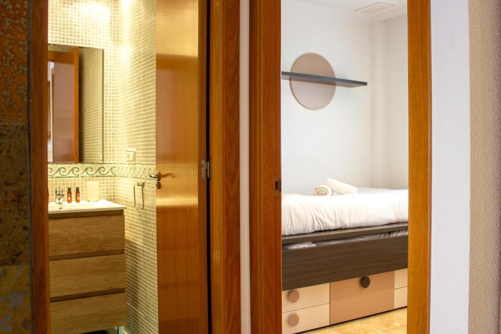 Posteľ alebo postele v izbe v ubytovaní Myflats Deluxe Balcon de Arenales