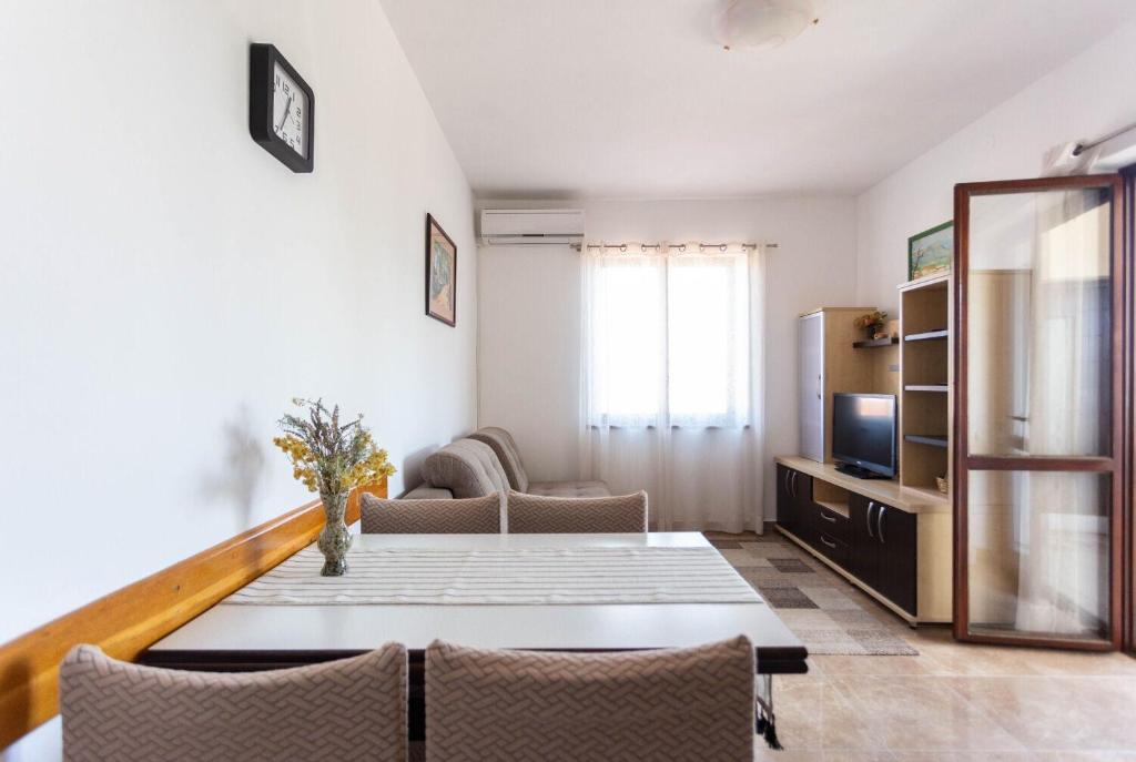 TV a/nebo společenská místnost v ubytování House Milka