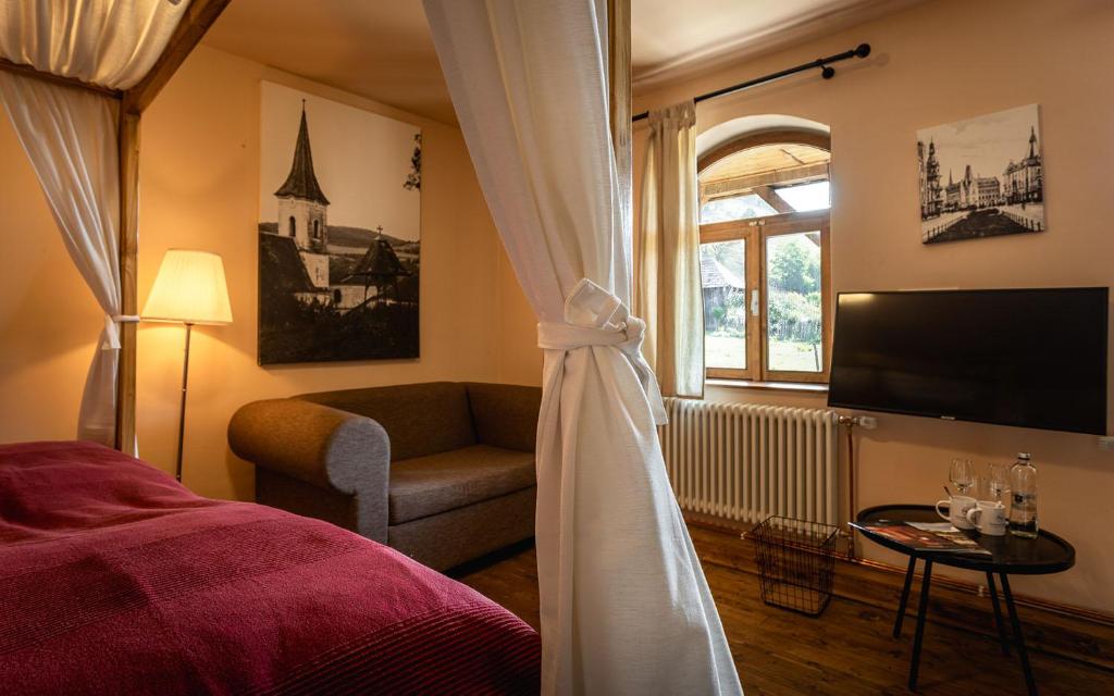 TV a/nebo společenská místnost v ubytování Valea Verde Retreat Transilvania
