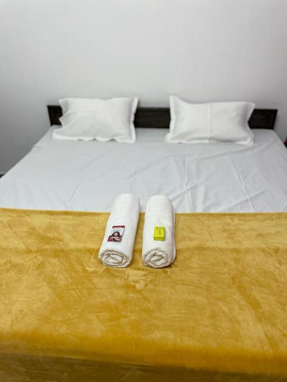 Postel nebo postele na pokoji v ubytování Shree Balaji Homestay