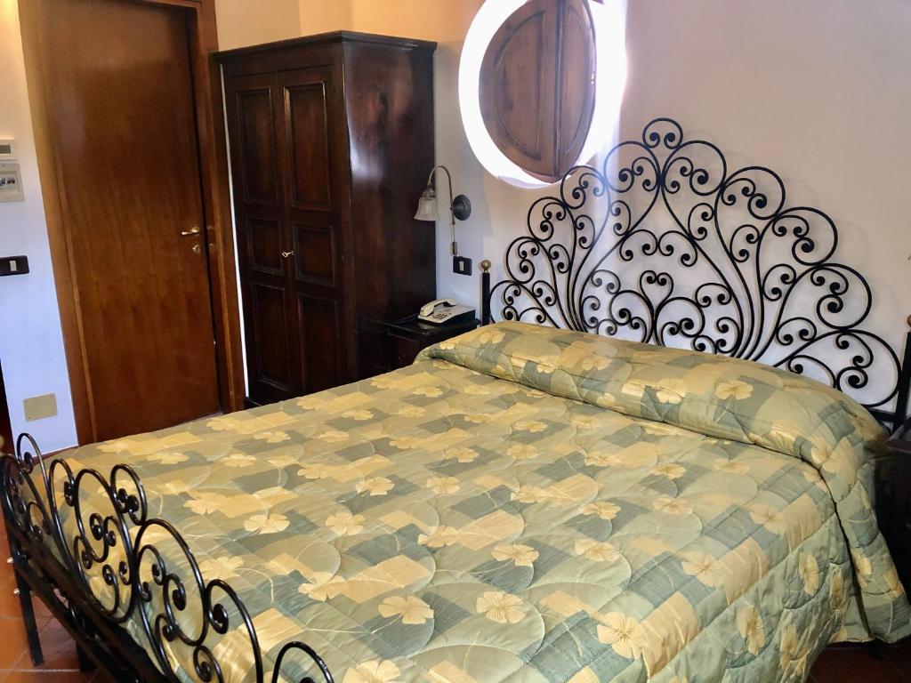 Posteľ alebo postele v izbe v ubytovaní Hotel Bucaneve