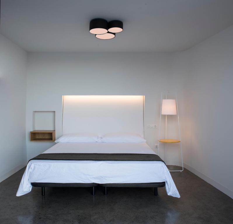 Postel nebo postele na pokoji v ubytování VULKANO Villas