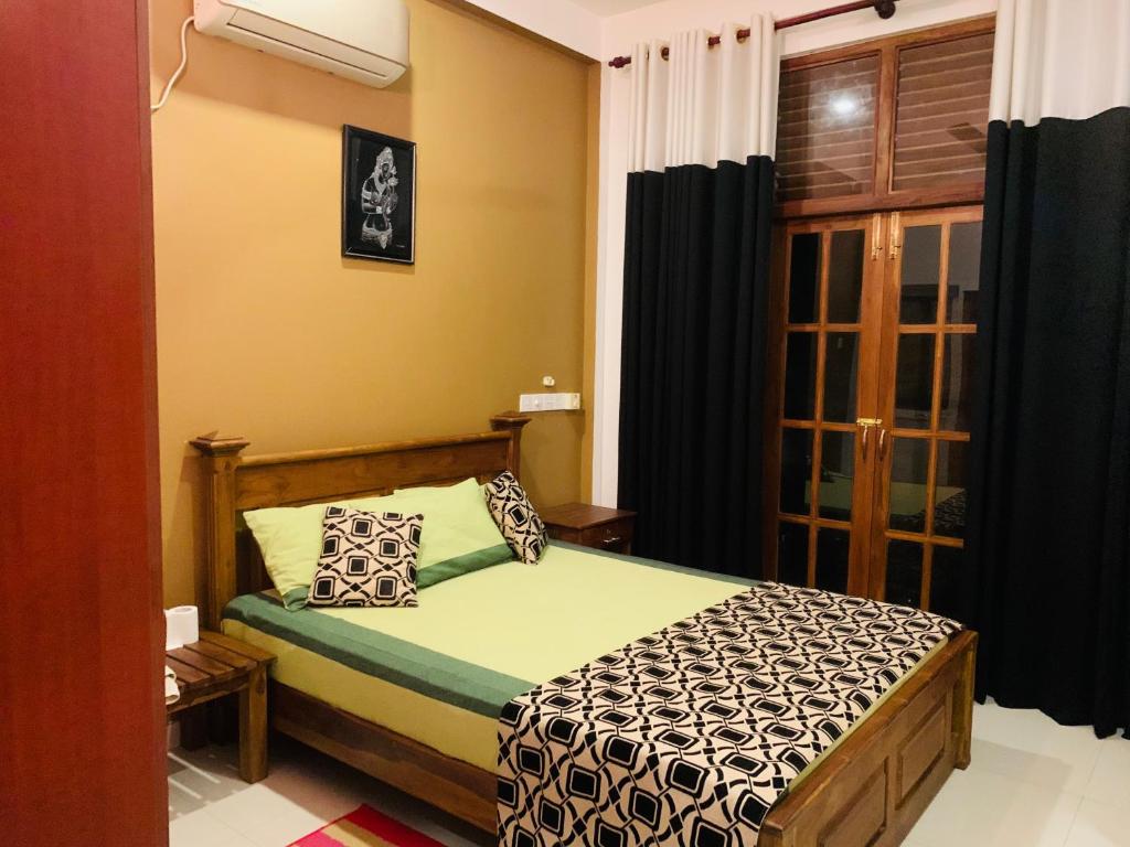 Postel nebo postele na pokoji v ubytování Summerland Residence