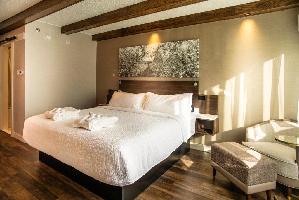 Postel nebo postele na pokoji v ubytování Old Orchard Inn