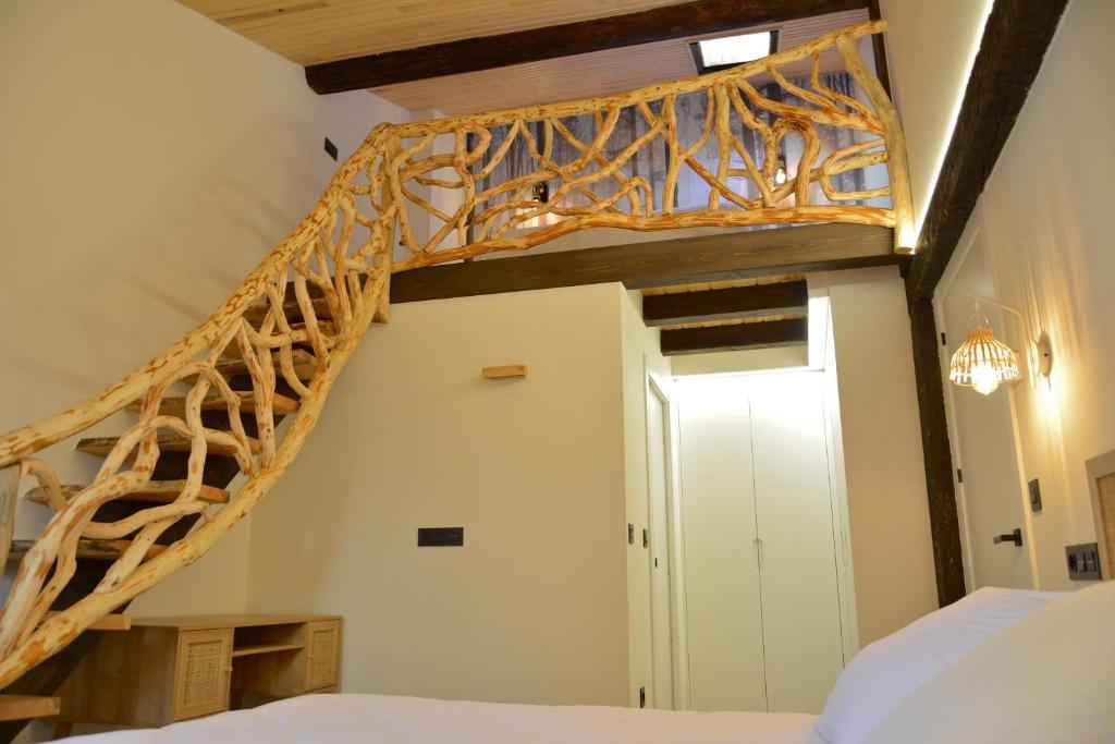 Cama o camas de una habitación en La casa de la abuela Gabina, Duruelo de la Sierra - 12 personas